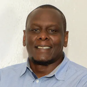 Head and shoulders photo of Joe Muturi.