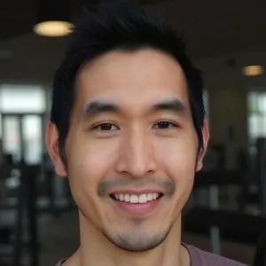 Head and shoulders photo of Kenneth Kou.