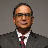 Head and shoulders photo of Avinash Persaud.